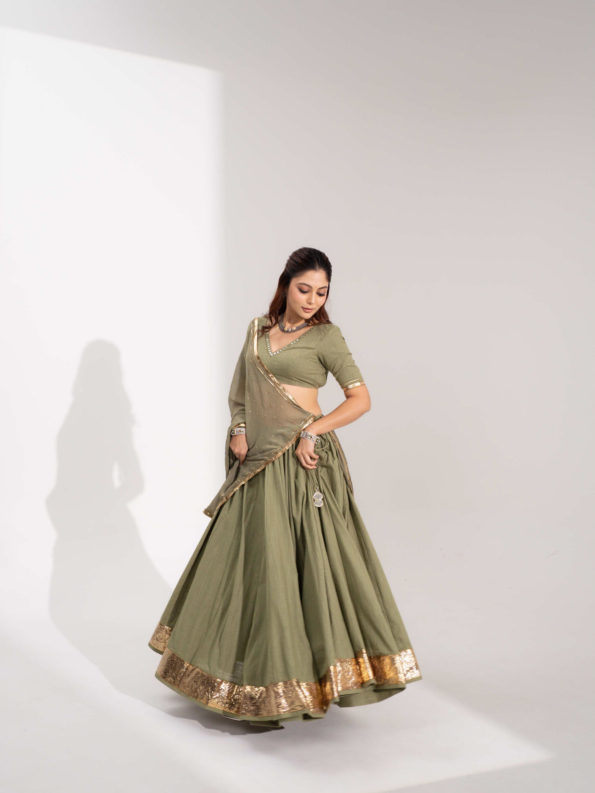 Vamika Olive Green Festive Flared Lehenga Choli Set