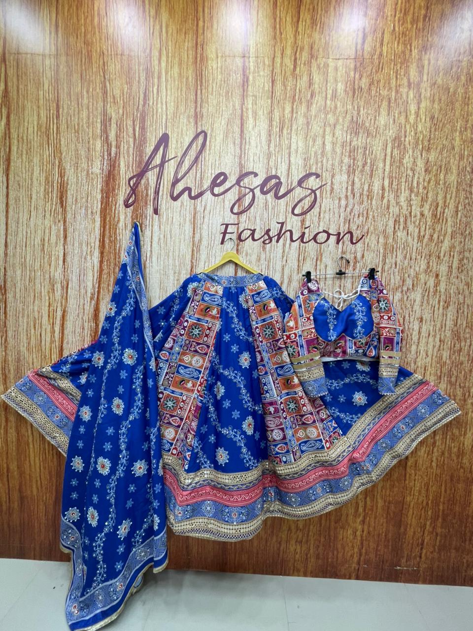 Blue Mirror Work Megic Navratri Lehenga Choli.