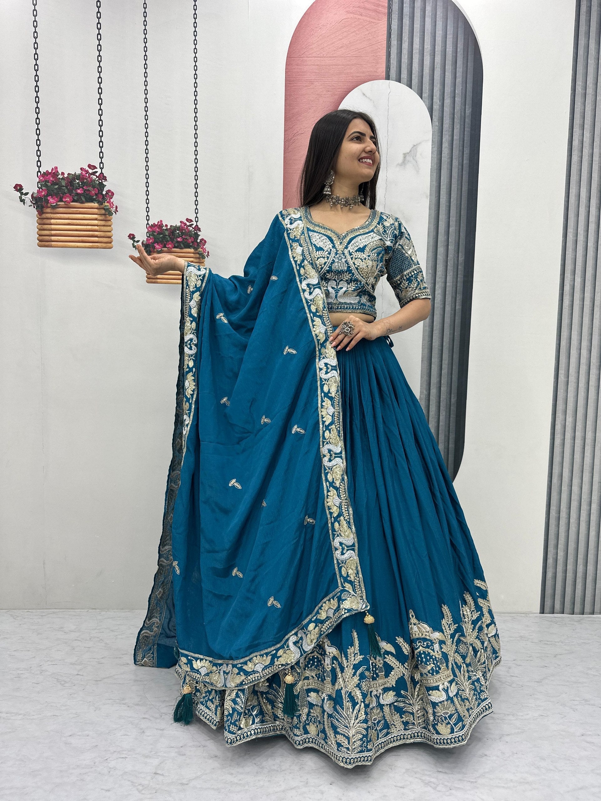 Mishika Chinon Heavy Embroidery Lehenga Choli