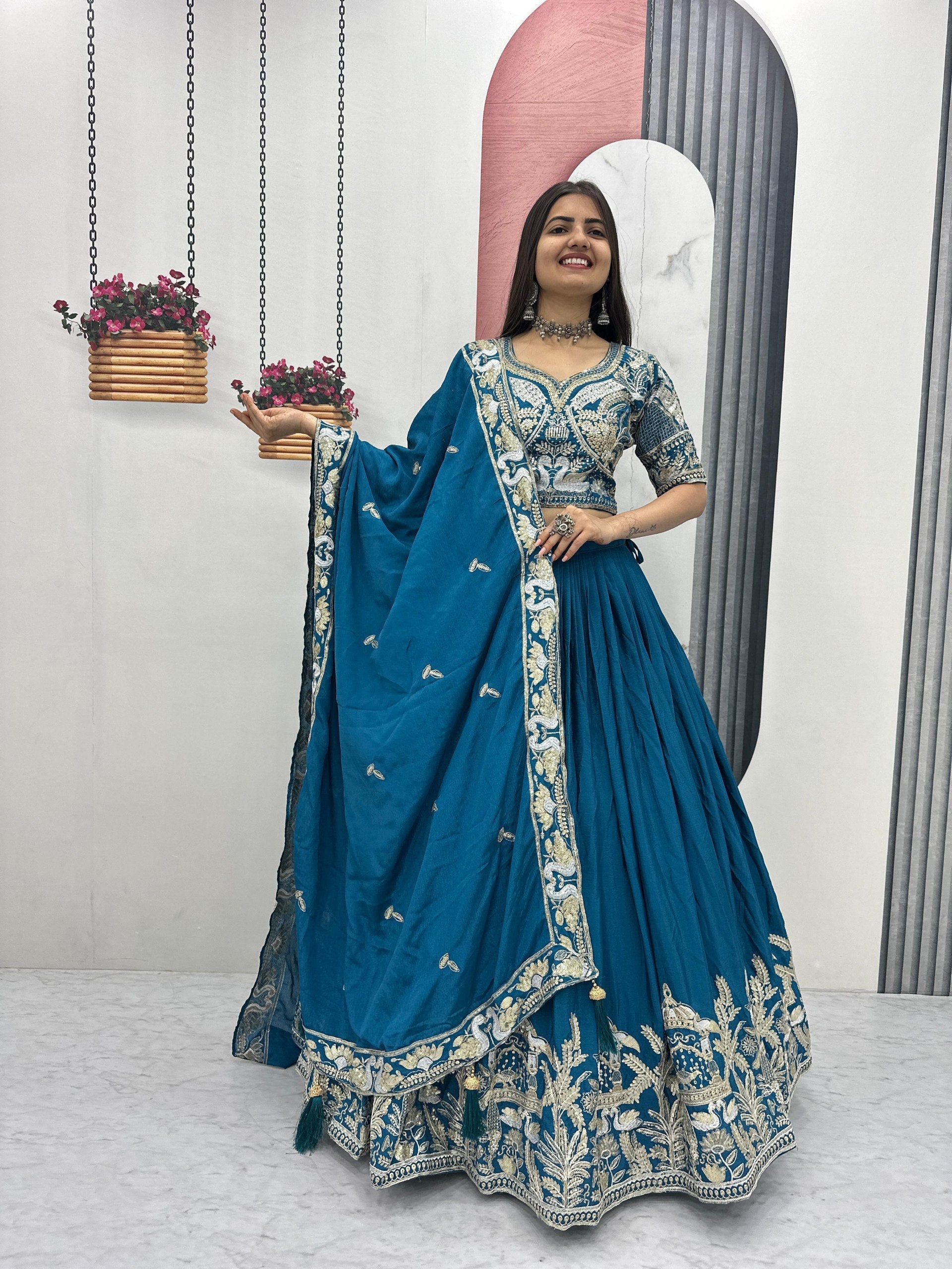 Mishika Chinon Heavy Embroidery Lehenga Choli